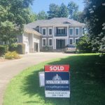 Home With Sold Sign